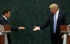 Mexico's President Enrique Pena Nieto and Republican presidential nominee Donald Trump shake hands after a joint statement at Los Pinos, the presidential official residence, in Mexico City, Wednesday, Aug. 31, 2016. Trump is calling his surprise visit to Mexico City a 'great honor.' The Republican presidential nominee said after meeting with Pena Nieto that the pair had a substantive, direct and constructive exchange of ideas.(AP Photo/Marco Ugarte)